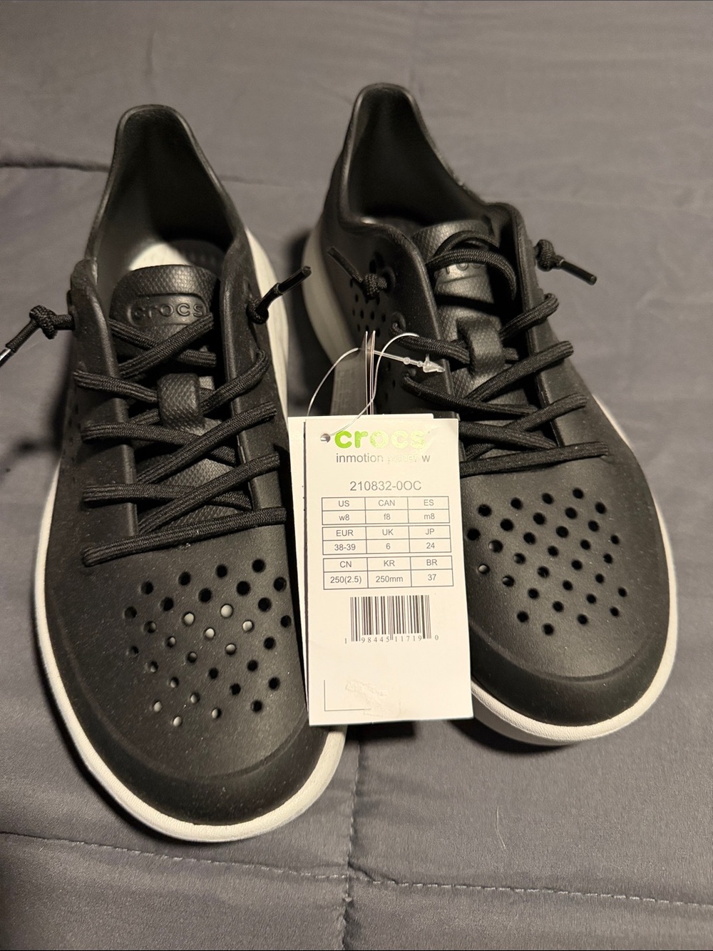 CROCS Women’s Black and White Lace-Up Sneakers